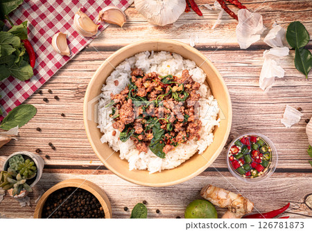 The Beef with basil in paper Bowl for Thai food concept. 126781873
