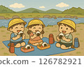 Kindergarteners eating onigiri bento lunches on a field trip to the river 126782921