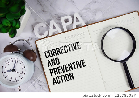 CAPA - Corrective and Preventive Action acronym on notepad, Business concept background CAPA - Corrective and Preventive Action acronym on notepad, Business concept background 126783057