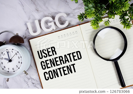 UGC - User Generated Content acronym on notepad, Marketing concept background 126783066