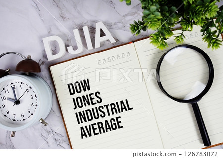 DJIA - Dow Jones Industrial Average acronym on notepad, Business concept background DJIA - Dow Jones Industrial Average acronym on notepad, Business concept background 126783072