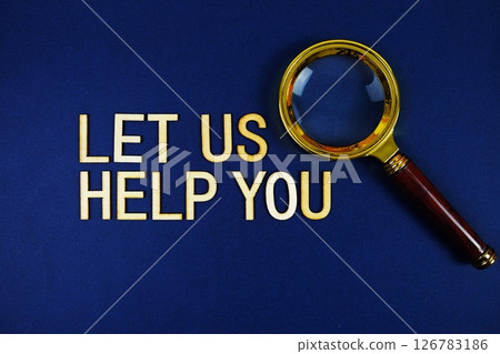 Let Us Help You alphabet letters with magnifying glass on navy blue background Let Us Help You alphabet letters with magnifying glass on navy blue background 126783186