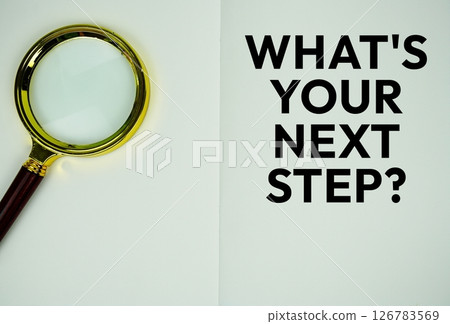 What is your next step? text message written on note page with magnifying glass What is your next step? text message written on note page with magnifying glass 126783569