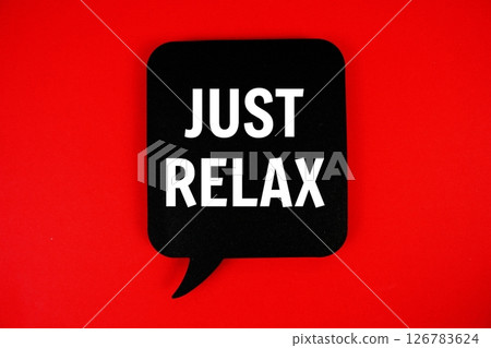 Just Relax text with speech bubble on red background Just Relax text with speech bubble on red background 126783624