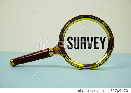 Survey text with magnifying on yellow background 126784470