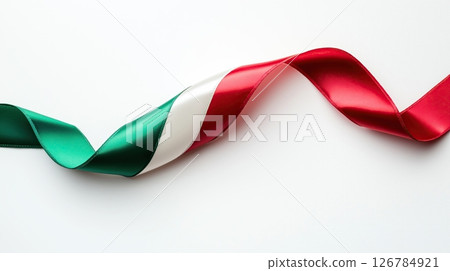 red, white and green ribbon or banner. The ribbon is made of a shiny, satin-like material and has a smooth texture.	 126784921