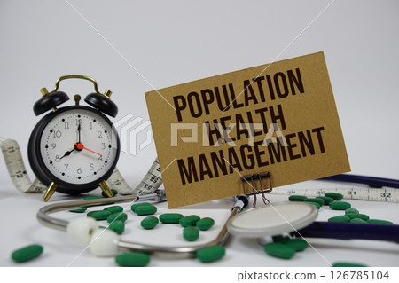Population Health Management text with alarm clock and Stethoscope on white background Population Health Management text with alarm clock and Stethoscope on white background 126785104