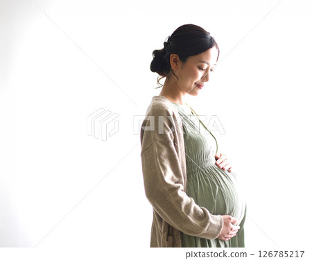 AI-generated image of a fictional pregnant woman on a white background 126785217