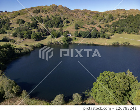 Loughrigg Tarn in the Lake District - Cumbria in the United Kingdom Loughrigg Tarn in the Lake District - Cumbria in the United Kingdom 126785241