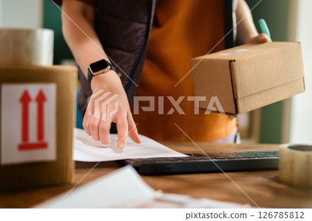 Woman working in a warehouse 126785812