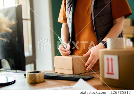 Woman working in a warehouse 126785813