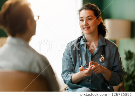 patient and a doctor talking patient and a doctor talking 126785895