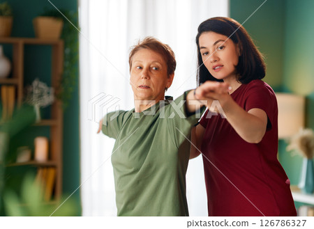 Senior woman doing exercise 126786327