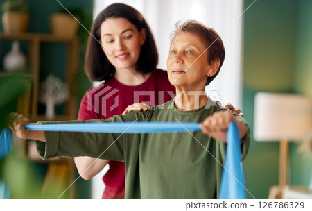 Senior woman doing exercise Senior woman doing exercise 126786329