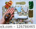 Spa and relax concept, natural organic cosmetics, based on snail slime. Flat lay. High quality photo Spa and relax concept, natural organic cosmetics, based on snail slime. Flat lay. High quality photo 126786465