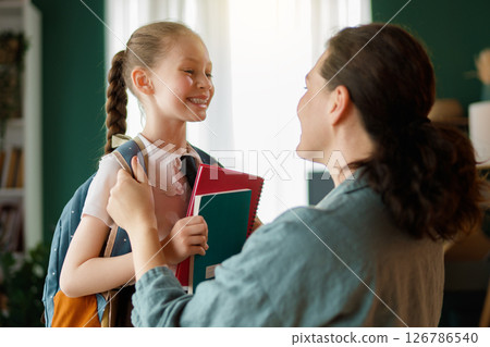 Happy family preparing for school 126786540