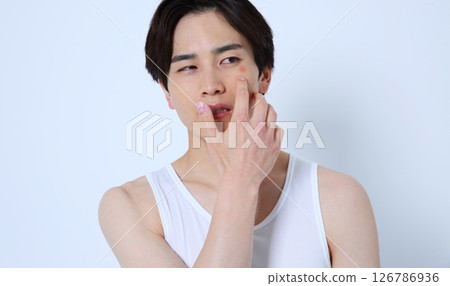 Image of a man suffering from acne and swelling Image of a man suffering from acne and swelling 126786936