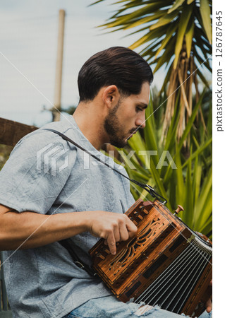 Man Playing The Traditional Organetto In South Italy Man Playing The Traditional Organetto In South Italy 126787645