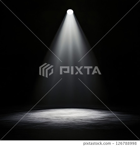 Single Spotlight Breaking Through the Darkness in Empty Space 126788998