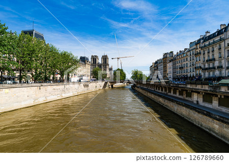 Seine River with Notre-Dame Cathedral and Parisian Architecture Seine River with Notre-Dame Cathedral and Parisian Architecture 126789660