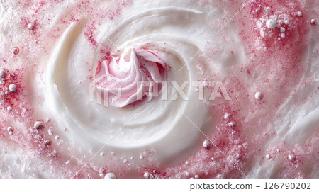 Swirled White Frosting with Pink Sprinkles on Cake 126790202