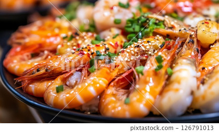 Close-Up of Grilled Shrimp Dish with Sesame Seeds and Green Onions 126791013