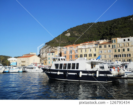 Sea view with boats and beautiful yachts . Corsica. French island. Port Bonifacio. Sea view with boats and beautiful yachts . Corsica. French island. Port Bonifacio. 126791434
