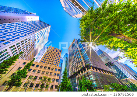 Tokyo cityscape in Japan: Fresh greenery...View of office buildings from the intersection in front of Otemachi Station. A ray of hope for a new era 126791506