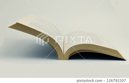 Open book displayed on a neutral background for reading. High quality photo 126792207