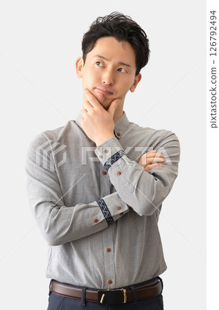 A male businessman thinking A male businessman thinking 126792494