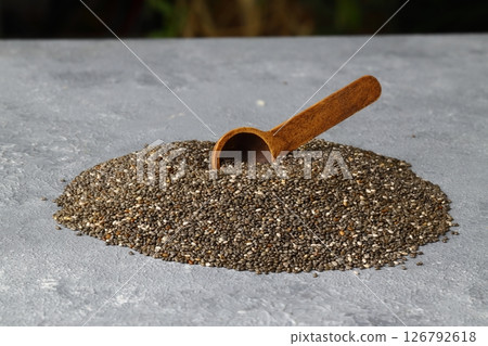 Chia seeds in wooden spoon. Healthy superfood rich in Omega 3 fatty acids 126792618