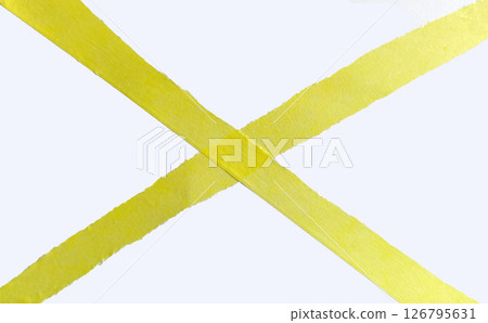 Yellow torn paper with ragged edges laid out in a cross, paper tape strips isolated on white background.  126795631