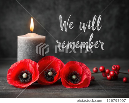 Remembrance Tribute with Poppies and Candle Remembrance Tribute with Poppies and Candle 126795907