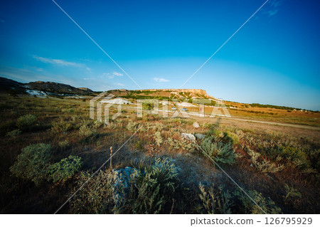 White rock dominating the landscape in Crimea White rock dominating the landscape in Crimea 126795929