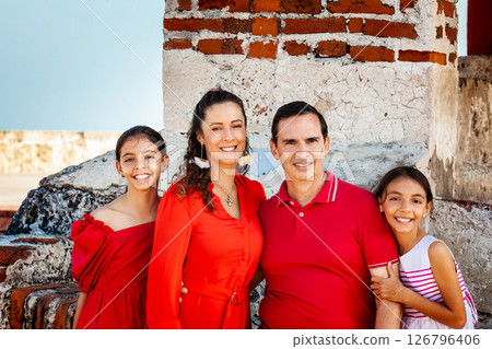 Young family of four traveling together. Family love concept. Travel concept. Cartagena de Indias. 126796406