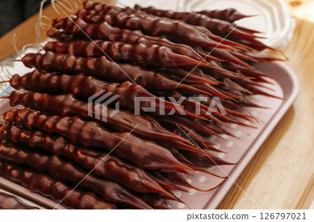 Traditional Georgian Churchkhela Sweets Made from Grapes and Walnuts 126797021