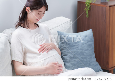Young pregnant woman 126797320