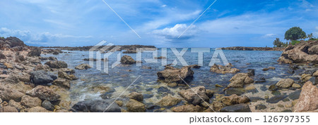 Rocky beach at Sharks Cove at Oahu north shore with tide pools.  126797355