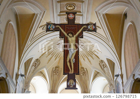 Painting of Christ on the Cross inside the church 126798715