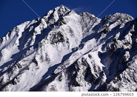 Nishihotakadake in a snowy landscape Nishihotakadake in a snowy landscape 126799603