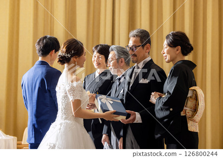 Thank you gift from the bride and groom to their parents Thank you gift from the bride and groom to their parents 126800244