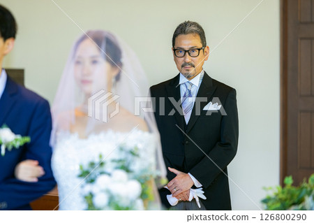 Father looking at bride 126800290