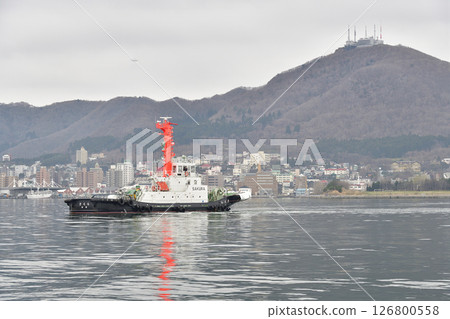A photo of a tugboat working at Hakodate Port in Hakodate, Hokkaido in spring 126800558