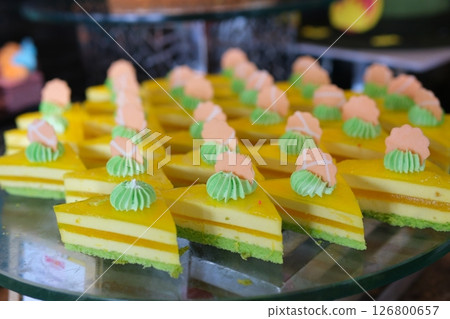 a plate of colorful Indonesian layered cakes a plate of colorful Indonesian layered cakes 126800657