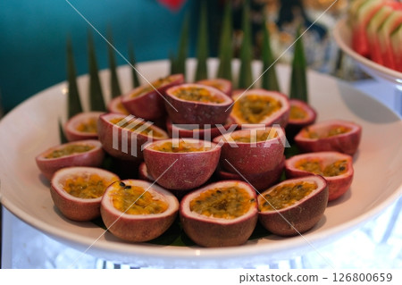 Passion Fruit, Maracuya on a White Background. Fresh Organic Passionfruit Plant Exotic Fruits Close up Passion Fruit, Maracuya on a White Background. Fresh Organic Passionfruit Plant Exotic Fruits Close up 126800659