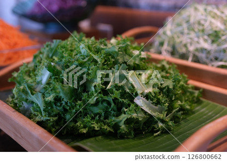 plate in the buffet Fresh green lettuce at a local market during the morning hours plate in the buffet Fresh green lettuce at a local market during the morning hours 126800662