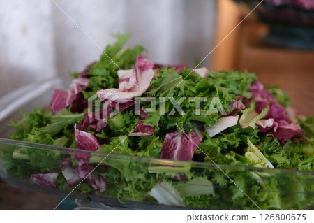 green and purple lettuce leaves in plate in a buffet 126800675