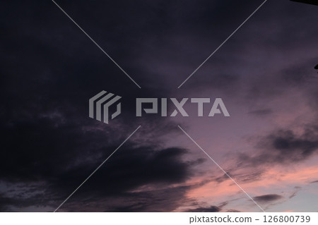 Panoramic view of sunset golden and blue sky nature background. Colorful dramatic sky with cloud at sunset.Sky background.Sky with clouds at sunset. Panoramic view of sunset golden and blue sky nature background. Colorful dramatic sky with cloud at sunset.Sky background.Sky with clouds at sunset. 126800739