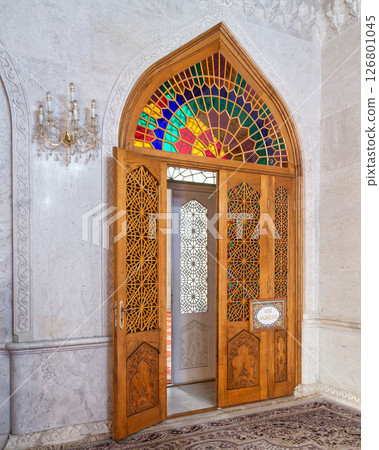 Exploration of an intricate stained glass wooden door at Bibi-Heybat Mosque in Baku, Azerbaijan Exploration of an intricate stained glass wooden door at Bibi-Heybat Mosque in Baku, Azerbaijan 126801045