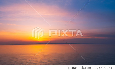 Sunset at Cape Kakuda: Sunset over Sado Island 126802073